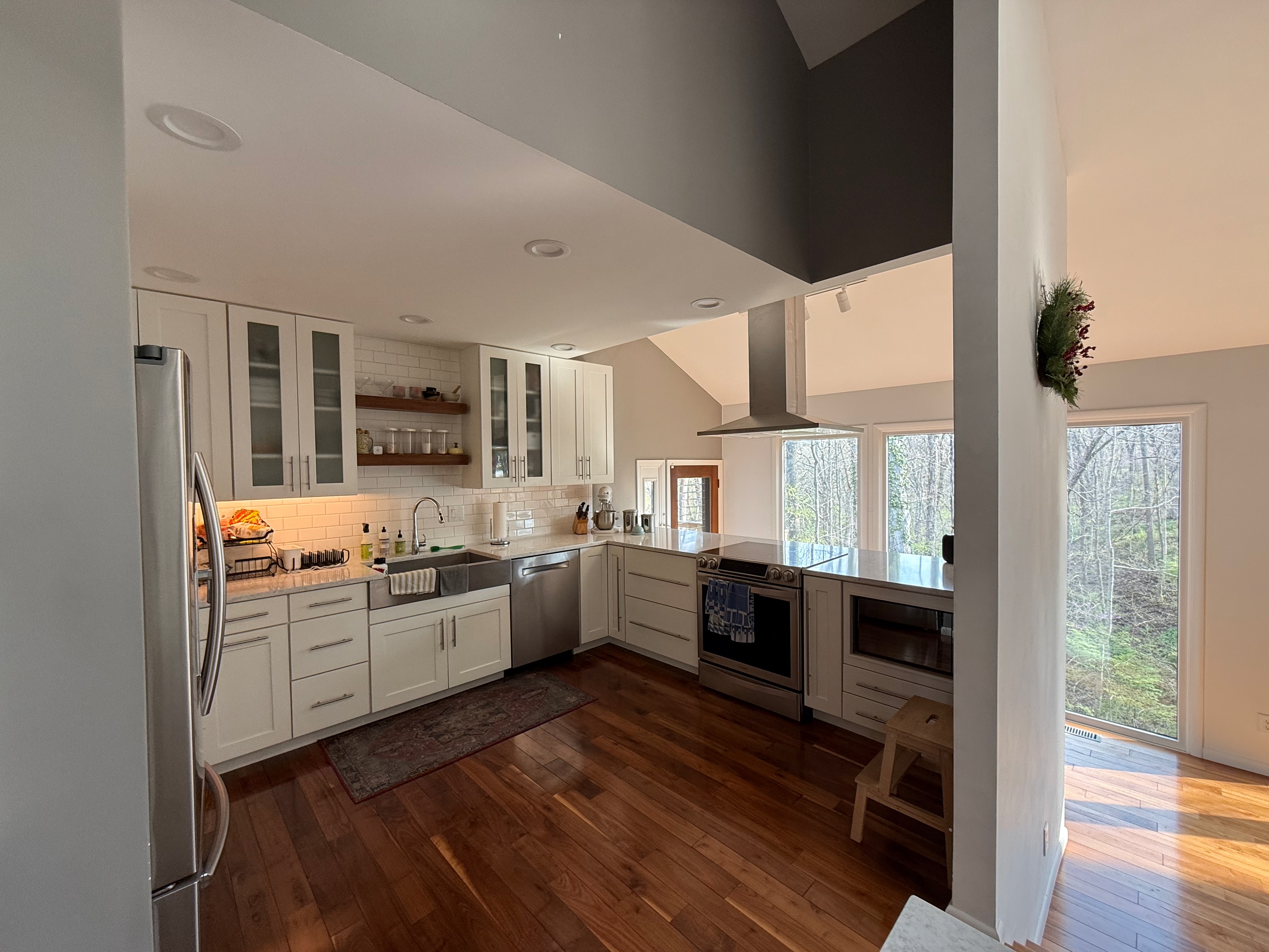Kitchen with white cabinets and stainless appliances